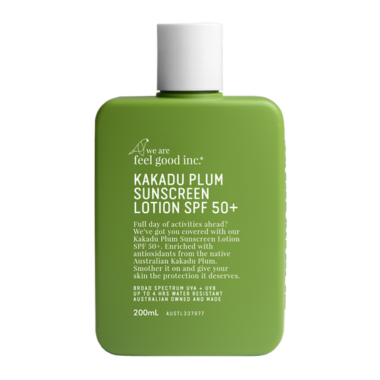 A olive green 200ml plastic bottle of We Are Feel Good Inc. Kakadu Plum Sunscreen Lotion SPF 50+