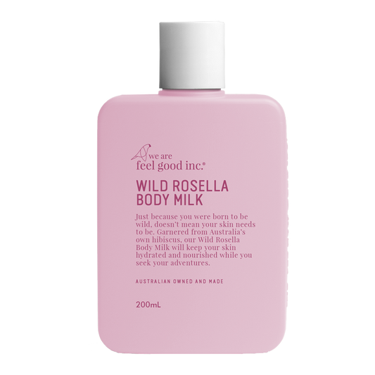 A pastel pink 200ml plastic bottle of We Are Feel Good Inc. Wild Rosella Body Milk lotion